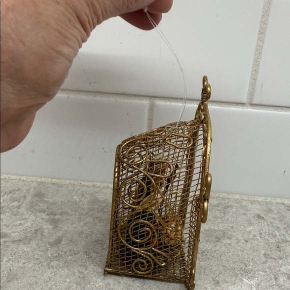 Gold Nativity Scene Christmas Ornament. 4.5x2x4 in. Metal and resin. - Picture 2 of 6